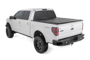 Ford F-150 Hard Low Profile Bed Cover - Rough Country - Tri-Fold - '04-'14